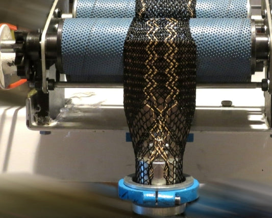 Fiber-based additive manufacturing using braiding. Continuous fiber lattices enable programmable structures for aerospace engineering, metamaterials, and textile research.