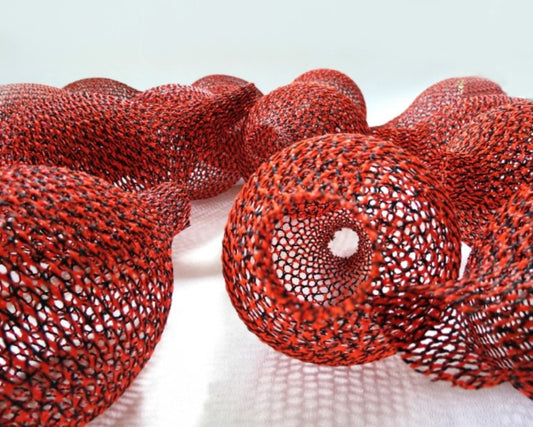 Braided metamaterials: fiber lattice structures engineered through braid geometry. Research on lightweight structural textiles relevant to aerospace, composites, and programmable materials.